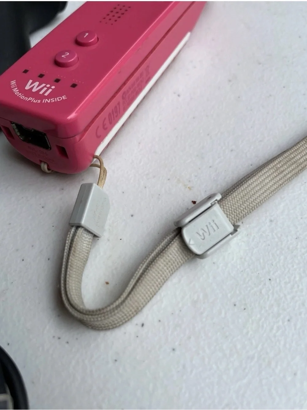 Nintendo Wii remote controller in Pink